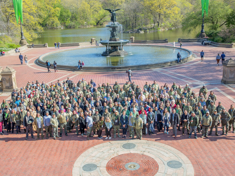 Group photo of Central Park Conservancy staff at Bethesda Fountain